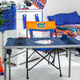 Image for article titled We Challenged Two Guys To Decorate A Dorm Room Using Only Fan Merch